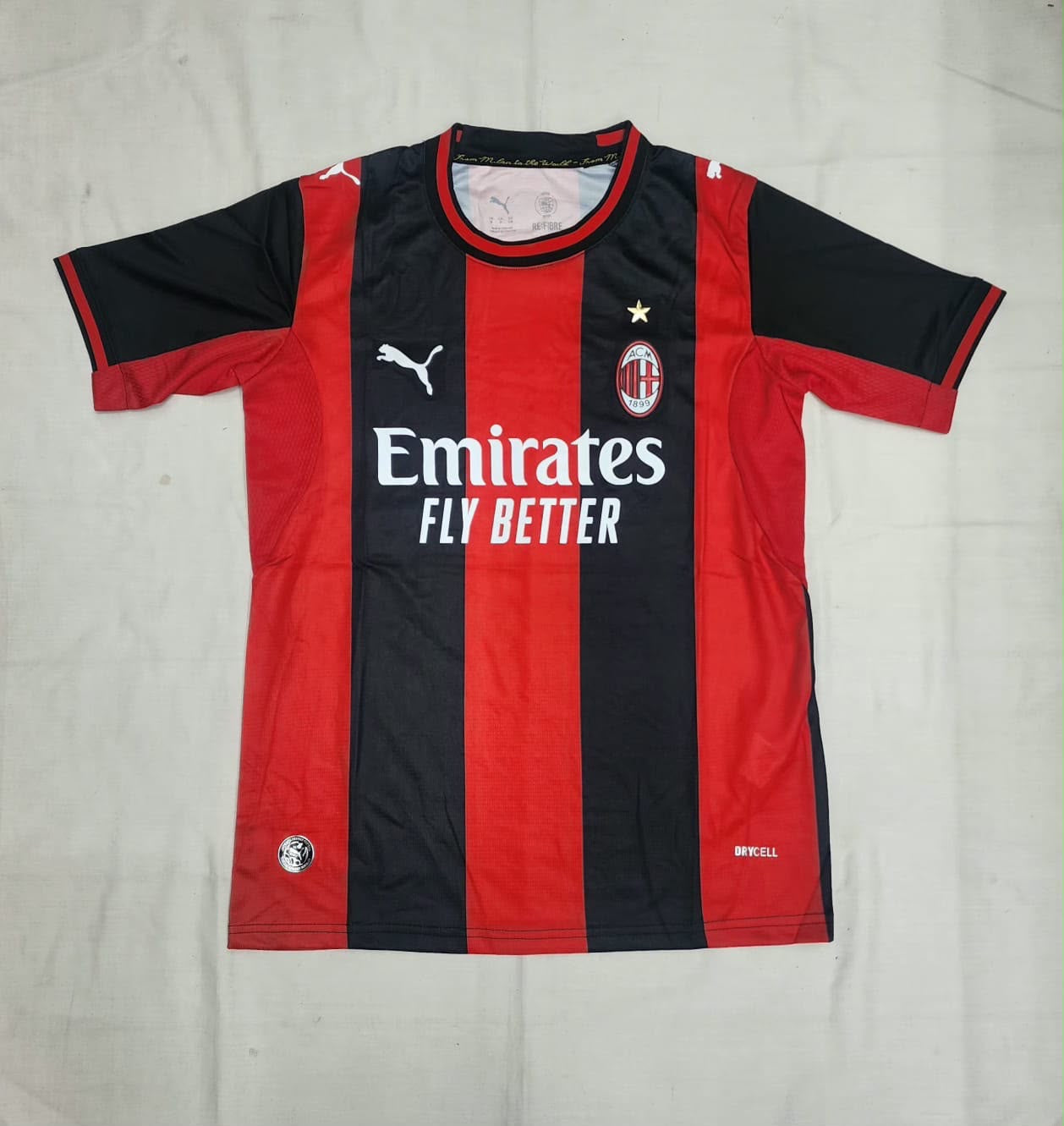 AC Milan Puma Home Jersey â€“ Red & Black Stripes | Emirates Fly Better Edition
