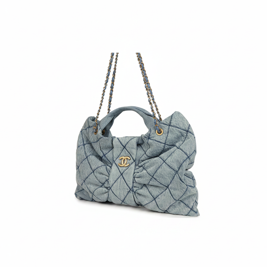 Chanel Quilted Denim Hobo Tote in Light Blue Washed Denim with Gold CC Logo and Aged Gold Chain Straps