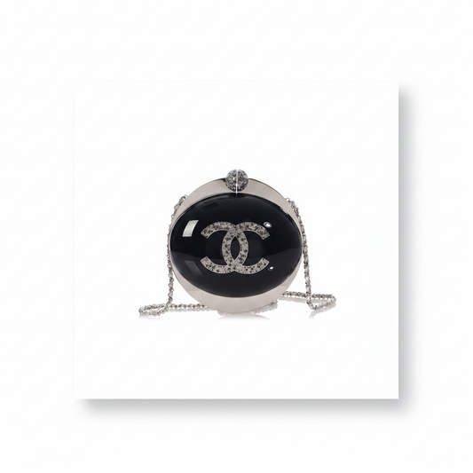 Chanel Round Ball MinaudiÃ¨re Clutch in Black and Silver Plexiglass with Crystal CC Logo
