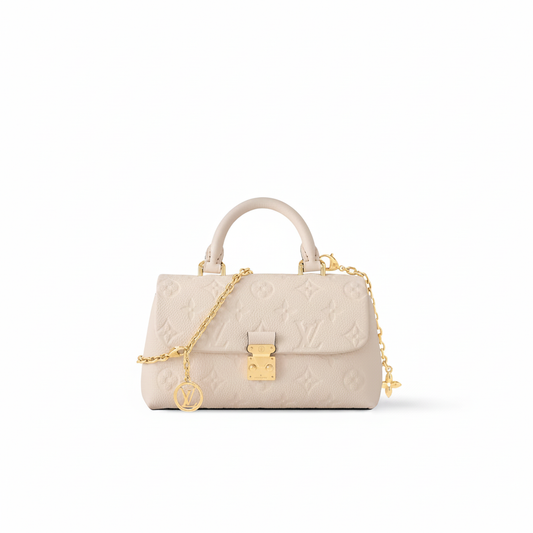 Louis Vuitton Madeleine BB in CrÃ¨me Monogram Empreinte with Gold Chain Strap and LV Charms