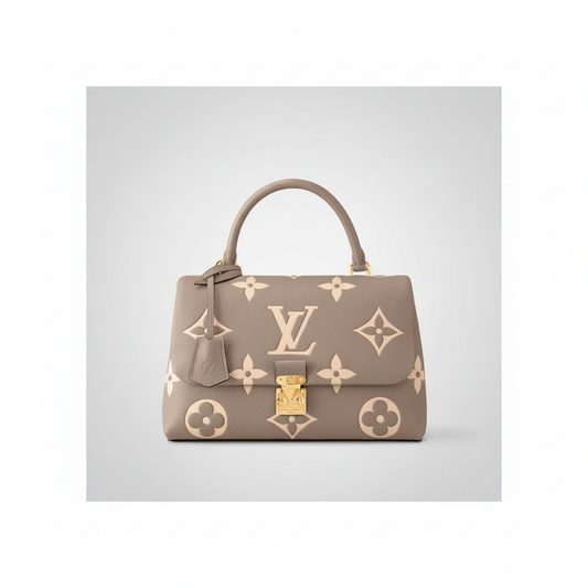 Louis Vuitton Madeleine BB in Tourterelle and CrÃ¨me Bicolor Giant Monogram Empreinte with Gold Hardware